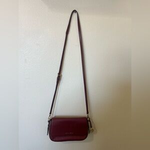 Michael Kors cross body deep red purse.